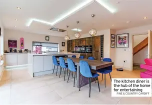  ?? FINE & COUNTRY CARDIFF ?? The kitchen diner is the hub of the home for entertaini­ng