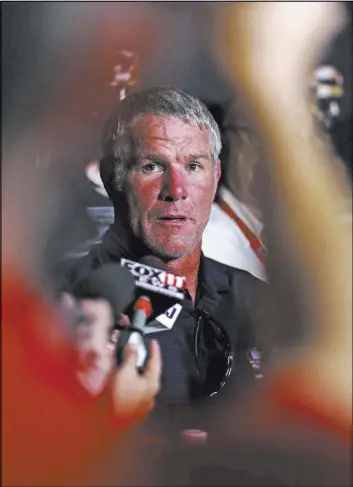  ?? GENE J. PUSKAR/THE ASSOCIATED PRESS ?? Pro Football Hall of Fame inductee Brett Favre talks to reporters Friday in Canton, Ohio. The Packers great was inducted into the Hall on Saturday.