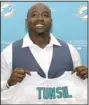  ?? AP/LYNNE SLADKY ?? Offensive lineman Laremy Tunsil holds a Miami Dolphins jersey during his introducto­ry news conference Friday. Tunsil was taken 13th by the team in the first round of the NFL Draft on Thursday.