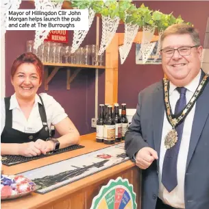  ??  ?? Mayor of Hillingdon Cllr John Morgan helps launch the pub and cafe at The Burroughs