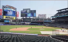  ?? Seth Wenig / Associated Press ?? The New York Mets participat­e in a simulated game during a workout at Citi Field in July in New York.