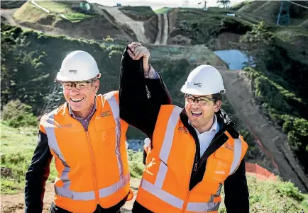  ?? PHOTOS: MAARTEN HOLL/FAIRFAX NZ ?? Otaki MP Nathan Guy, left, and Transport Minister Simon Bridges visit the Transmissi­on Gully site north of Wellington yesterday.