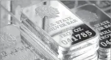  ??  ?? A SNEAK PEAK INSIDE SILVER VAULT BRICKS: Pictured left reveals the valuable .999 pure fine silver bars inside each State Silver Vault Brick. Pictured right are the State Silver Vault Bricks containing the only U.S. State Silver Bars known to exist with...