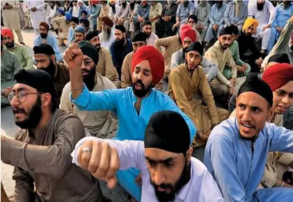  ?? Peshawar. Photo: Reuters ?? Members of the Pakistan’s Sikh community, protest, after, according to police, two Sikh men were killed by gunmen, in