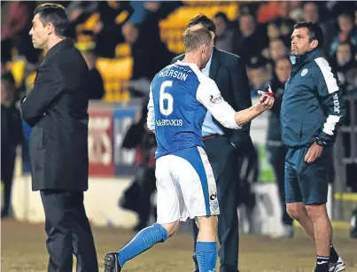  ?? Picture: SNS. ?? Saints captain Steven Anderson heads for the dressing-room after his sending-off.