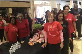  ?? SUBMITTED PHOTO ?? Deidre Patterson (front, right) helped organize the “Pink Goes Red” event at Plymouth Meeting Mall in 2020.