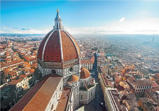  ??  ?? Cathedral Santa Maria del Fiore towers over Florence a city at the heart of Renaissanc­e Italy. The old buildings still stand while modern structures collapse in rainstorms.