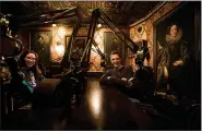  ?? SARAH REINGEWIRT­Z — SOUTHERN CALIFORNIA NEWS GROUP ?? Lauren and Trevor Shand sit in the elaboratel­y decorated Speakeasy Studio, the sanctum in their Burbank home where they record their podcast, “The Boo Crew.” The rest of the house is stuffed with horror movie props and items.