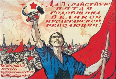  ?? ?? Long Live The Fifth Anniversar­y Of The Great Proletaria­n Revolution!, a Russian Soviet lithograph poster from 1922 by Ivan Simakov