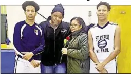  ??  ?? Police are probing the Staten Island shooting of Dayvon Hall (left) and his mother, minister Monique Hall (center, with husband Irvin and Dayvon’s twin, Devin), as a possible case of mistaken identity.