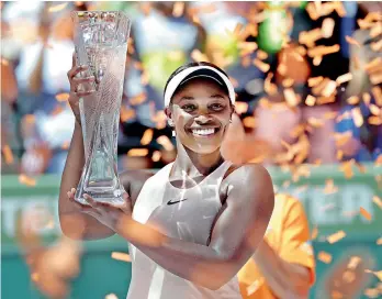  ?? AP ?? Sloane Stephens holds her trophy after defeating Jelena Ostapenko, of Latvia, in the final of the Miami Open on Saturday in Key Biscayne. Stephens won 7-6 (5), 6-1. —