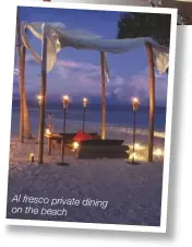  ??  ?? Al fresco private dining on the beach