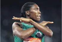  ?? PHOTO: GETTY IMAGES ?? Caster Semenya, of South Africa, celebrates winning gold in the women’s 1500m final at Carrara Stadium on Tuesday night.