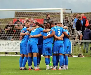  ?? ?? Larkhall Athletic huddle before the clash