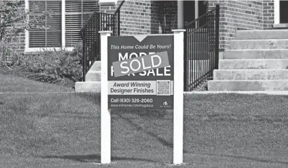  ?? NAM Y. HUH/AP ?? Elevated home prices, rising interest rates and steep competitio­n are interrupti­ng millennial­s’ plans to get that quintessen­tial piece of the American dream – their first home, or an upgrade from a small starter home. If you were planning on buying a home over the past year or so, you may have started the process by getting a mortgage preapprova­l and working with a real estate agent, only to cancel it all and stay put.