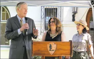  ?? The Sentinel-Record/Richard Rasmussen ?? REOPENING: Hot Springs Mayor Pat McCabe, left, his wife, Ellen McCabe, and Hot Springs National Park Superinten­dent Josie Fernandez attend a lease signing ceremony on Friday at the Hale Bath House. The McCabes plan to reopen the bath house as the...