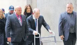  ?? AP ?? Harvey Weinstein (centre) arrives for a court hearing, yesterday in New York.