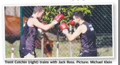  ??  ?? Trent Cotchin (right) trains with Jack Ross. Picture: Michael Klein