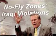  ?? AP photo ?? In this Sept. 30, 2002, file photo, Defense Secretary Donald H. Rumsfeld speaks at a Pentagon news conference to criticize Iraq for continuing to fire on U.S. and British warplanes patrolling over two no-fly zones.