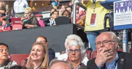  ??  ?? Ron Barber and his wife, Nancy, listen to speakers Tuesday at the Democratic National Convention in Philadelph­ia.