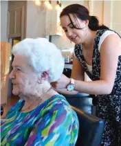  ??  ?? There may have been name changes and hairdresse­rs come and go but Joan Peterson has been having her weekly “hairdo” at the same salon for 35 years. Vanessa McLean of Finess Hair put the finishing touches on her birthday style on Friday.