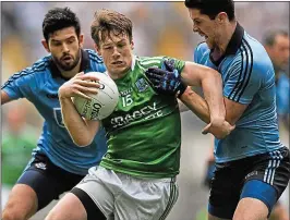  ??  ?? CONFIDENCE: Fermanagh’s Tomás Corrigan takes on Dublin’s defence