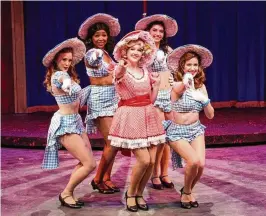  ?? JUSTIN WALTON / PHOTO CREDIT ?? Allison Gabert (Adelaide, center) and the Hot Box Girls perform “A Bushel and A Peck” in La Comedia Dinner Theatre’s production of “Guys and Dolls.”