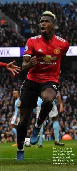  ?? AFP, AP ?? Smalling viert de beslissend­e goal met Pogba. Rechts: Lukaku in duel met Kompany, die scoorde.FOTO'S