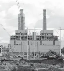  ?? Ted S. Warren / Associated Press file ?? The coal-burning TransAlta plant is near Centralia, Wash. Nearly all U.S. plants comply with rules on mercury.