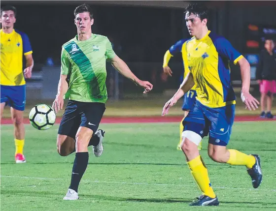  ?? MY BALL: Northern Fury goal scorer Jarrod Green takes possession against the Brisbane Strikers at the Townsville Sports Reserve. Picture: SCOTT RADFORD- CHISHOLM ??