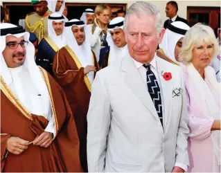  ??  ?? Blow: Charles and Camilla in Bahrain during their 201 Middle East tour