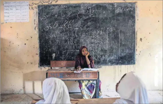  ??  ?? No going back: The education of many Nigerian schoolgirl­s comes to a halt when they get married off. Photo: Joe Penney/Reuters