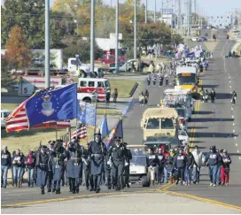  ?? [OKLAHOMAN ARCHIVES PHOTO] ?? The 2014 Veterans Day Parade makes its way down SE 15 in Midwest City. This year’s parade is Friday.