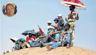  ?? Picture: THULANI MBELE ?? SAD MEMORIES: Nomakhephu Mosebetsan­e and thousands of others gathered in Marikana on the sixth anniversar­y of the Marikana massacre, when 34 miners were gunned down in 2012 near the Lonmin mine when miners protested for better wages.