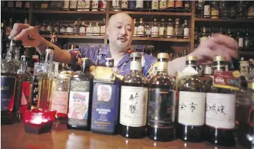  ?? EUGENE HOSHIKO/THE ASSOCIATED PRESS ?? Zoetrope bar owner and bartender Atsushi Horigami says Japanese whisky has an “unpredicta­bility that makes it fun.”