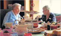  ??  ?? Time for tea The charity organises tea parties for older people and are looking for volunteers in Ayrshire