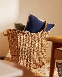  ??  ?? Texture, texture, texture! Natural materials offer depth and create a well-rounded decorating scheme. Jute BASKET with Handles, $50, zarahome.com.