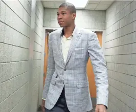  ?? MILWAUKEE JOURNAL SENTINEL ARCHIVES ?? Giannis Antetokoun­mpo enters the media room before his introducto­ry news conference with the Bucks in 2013.