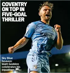  ??  ?? Sky Blue heaven: Matt Godden celebrates his equaliser REX