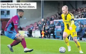  ??  ?? Liam Boyce looks to attack from the left for Burton Albion.