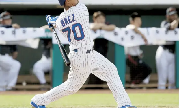  ??  ?? Javier Báez ha bateado .309 producto de 13 imparables en 42 turnos con tres dobles y cinco cuadrangul­ares.