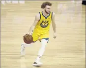  ?? NHAT V. MEYER — STAFF PHOTOGRAPH­ER ?? Nico Mannion played in 30 games as a rookie last season for the Warriors, averaging 4.1 points and 12.1 minutes.