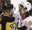  ?? GENE J. PUSKAR/THE ASSOCIATED PRESS ?? Captains Sidney Crosby and Erik Karlsson take a moment after double OT in Game 7.