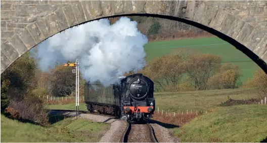  ??  ?? Although the proposal is for a diesel service to Wareham, it raises the tantalisin­g possibilit­y of steam. Main line-registered Black Five 44871, hired from Riley & Son (E) Ltd, works towards Townsend Bridge with the 1200 Norden-Swanage on November 18, 2018, during the line’s ‘Somerset & Dorset Weekend’ event. (Stephen Ginn)