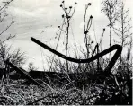  ??  ?? BOTTOM RIGHT: Vacant lots, barren foundation­s and scraps mark the site of a 1961 jet crash in Midwest City’s Glenwood addition four years later as seen in this photo from 1965.