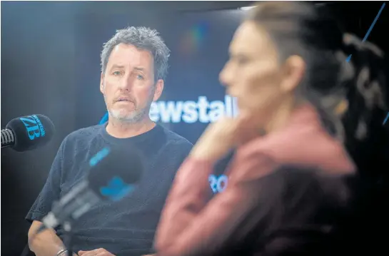  ?? Photo / File ?? Newstalk ZB’S Mike Hosking with Jacinda Ardern.