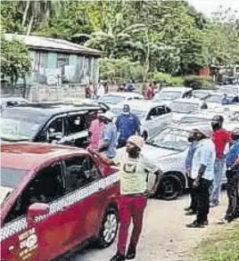  ??  ?? Taxi drivers in Clarendon withdrew their service on Monday to protest poor road conditions.
