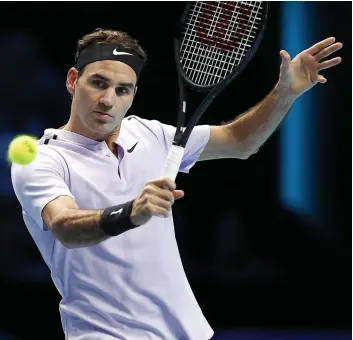  ?? PHOTO AFP ?? Roger Federer, vainqueur de 19 tournois du grand Chelem, a vaincu, hier, à Londres, la neuvième raquette mondiale, Jack Sock, à son premier match du Masters.