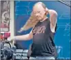  ??  ?? Metalhead/NFL analyst John Clayton rocks a ponytail in this ESPN commercial.