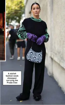  ?? ?? A stylish fashion week showgoer carryingPt­hraeda Cleo Prada Cleborushe­d leather shoulder bag, $3,650